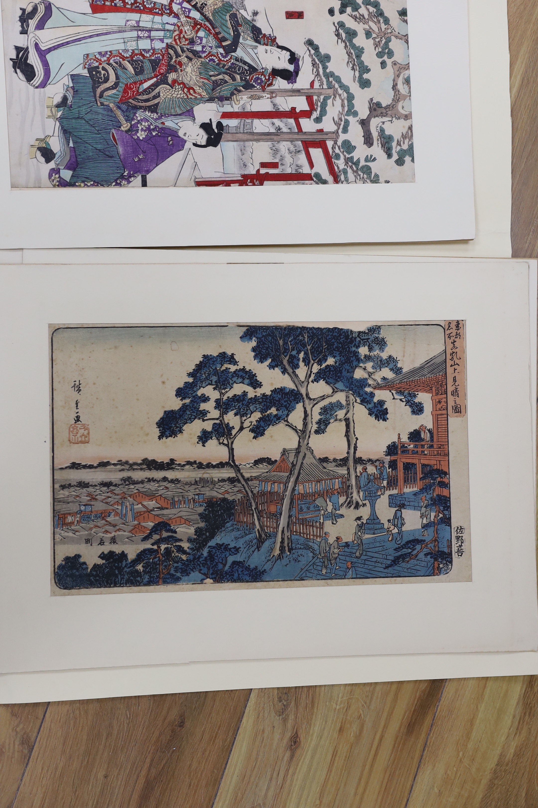 A folio of six Japanese woodblock prints, including examples after Utagawa Kunisada and Utagawa Kunisada II, mounted, unframed, 34 x 23cm
